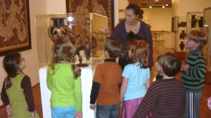 Children observe one of the many unique collections displayed at the UM Museum. 