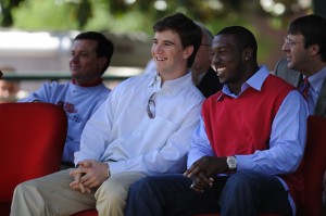 Eli Manning and Patrick Willis speak on the Grove stage at a spring event. 