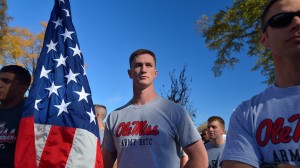 2014 Egg Bowl Run.  Mississippi State ROTC cadets hand off the ball to the Ole Miss ROTC in Calhoun City.  Photo by Kevin Bain/Ole Miss Communications