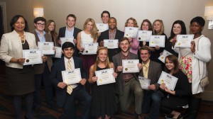 University of Mississippi print and broadcast journalism students proudly display awards won at the Southeast Journalism Conference competition.