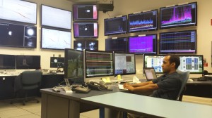 UM postdoc Shivaraj Kandhasamy works in the LIGO control room in Louisiana.