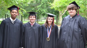 Not all students graduating this spring from the University of Mississippi High School were able to attend a physical graduation ceremony, but several traveled to Oxford to participate. They are, from left, Nicolas Thomas of Arlington, Texas, Logan Johnson of Crystal Springs, Jimmie Ann Hall of Nettleton and Tyler Tatum of Clinton.
