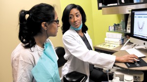 Dr. Chandra Minor, right, discusses treatment options with Divya Patel of Flowood.