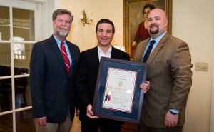 Eric Donahoe (center) receives a plaque, acknowledging his admittance into the 1848 Society, which recognizes generous donors who provide for the university through planned and deferred gifts. Presenting the award are business school Dean Ken Cyree (left) and Adam Lee, the school's development officer.