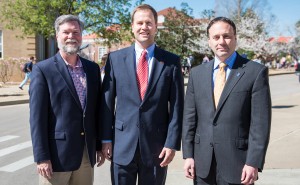 Denson Hollis (center), senior director of development for the UM College of Liberal Arts, congratulates Ken Cyree (left), dean of the School of Business Administration, and Lee Cohen, liberal arts dean, on the establishment of scholarships benefiting students in their respective academic units.