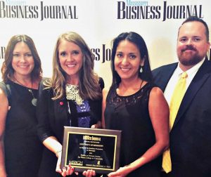 The University of Mississippi was recently named "Mississippi's Healthiest Workplace" among colleges and universities. RebelWell team members (Left to right) Kelley Pinion, Jessica Hughes, Mariana Anaya and Michael Newsom were on hand to receive the award at a luncheon in Jackson.