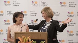 Friends of Children's Hospital board chair Sara Ray, left, is thanked by Dr. LouAnn Woodward, UMMC vice chancellor for health affairs and dean of the School of Medicine, for the nonprofit group's $20 million pledge to the Children's of Mississippi capital campaign.