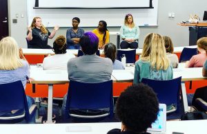 Hannaford, far left, presented her findings in working with the Baddour Center during a graduate student panel discussion for undergraduate social work students. Submitted photo