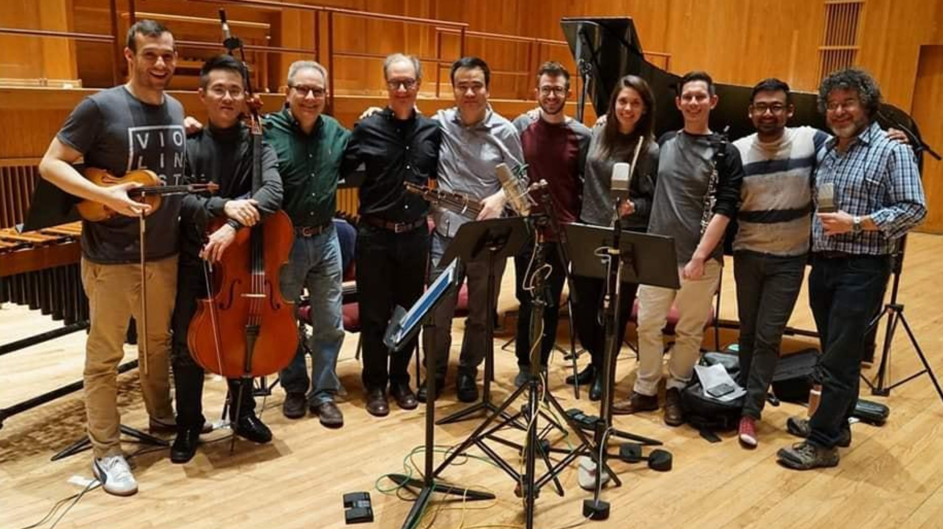 Members of chamber ensemble All of the Above pause for a photo during the recording of the ‘Double Portrait’ album. The group uncludes (from left) Scott Jackson, violin; Yijia Fang, cello; Edward Smaldone and Douglas Knehas, composers; Hu Jianging, sheng; Matthew Umphreys, piano; Nave Graham, flute; Mikey Arbulu, clarinet; David Abraham, percussion; and Adam Abeshouse, producer. Submitted photo