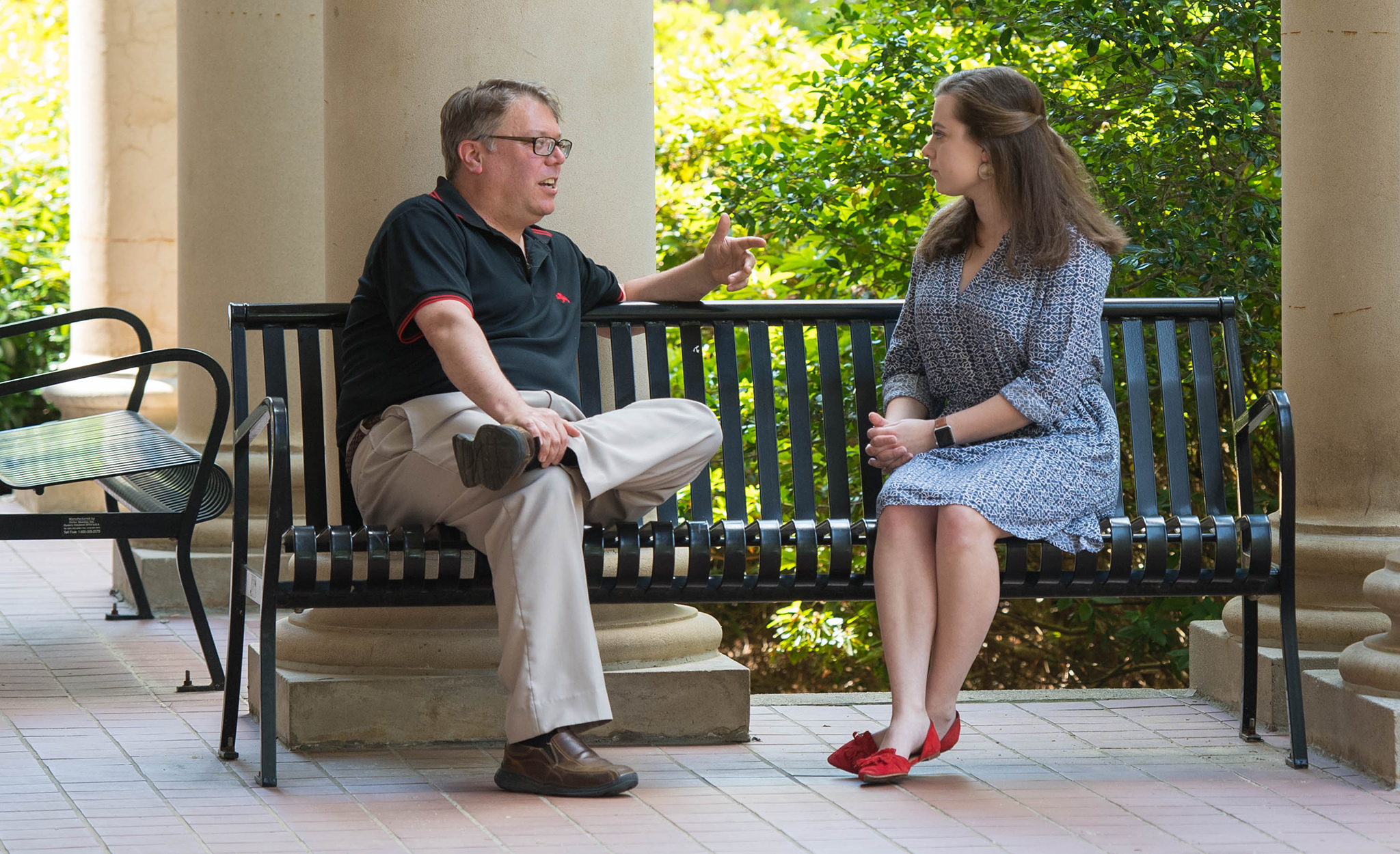 Daniel O’Sullivan (left), UM chair and professor of modern languages, chats with a student. Photo by Kevin Bain/Ole Miss Digital Imaging Services