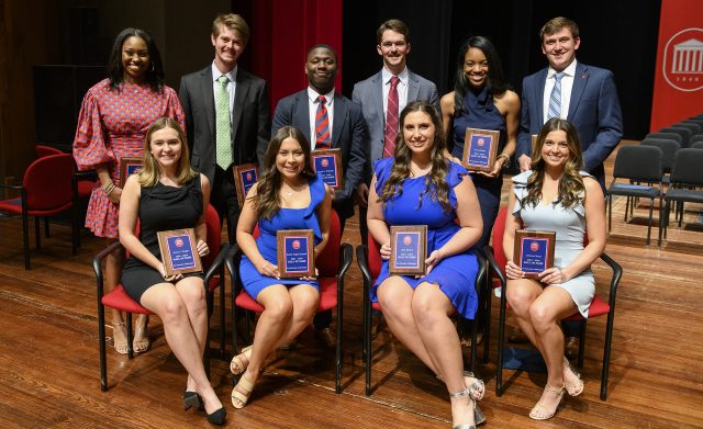 Members of the UM 2021-22 Hall of Fame were introduced in ceremonies Friday evening (April 8) at the Gertrude C. Ford Center for the Performing Arts. They are: (front, from left) Grace Dragna, Katelin Hayward, Ella Endorf and Brianna Berry, and (back, from left) Madison Gordon, Matt Knerr, Devan Williams, Merrick McCool, Jon’na Bailey and Ian Pigg. Photo by Thomas Graning/Ole Miss Digital Imaging Services