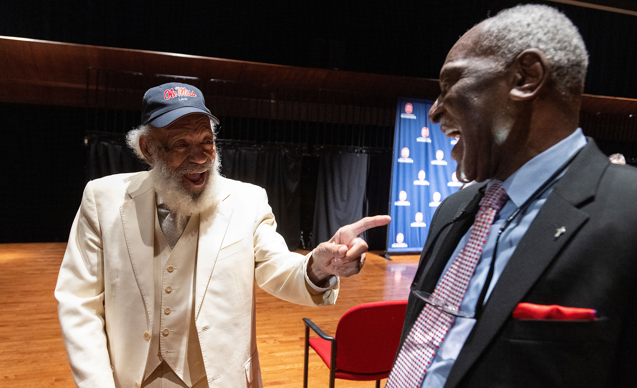James Meredith (left) shares a laugh with Don Cole, former mathematics professor and longtime university administrator, after Wednesday evening’s (Sept. 28) program in the Ford Center. Photo by Thomas Graning/Ole Miss Digital Imaging Services