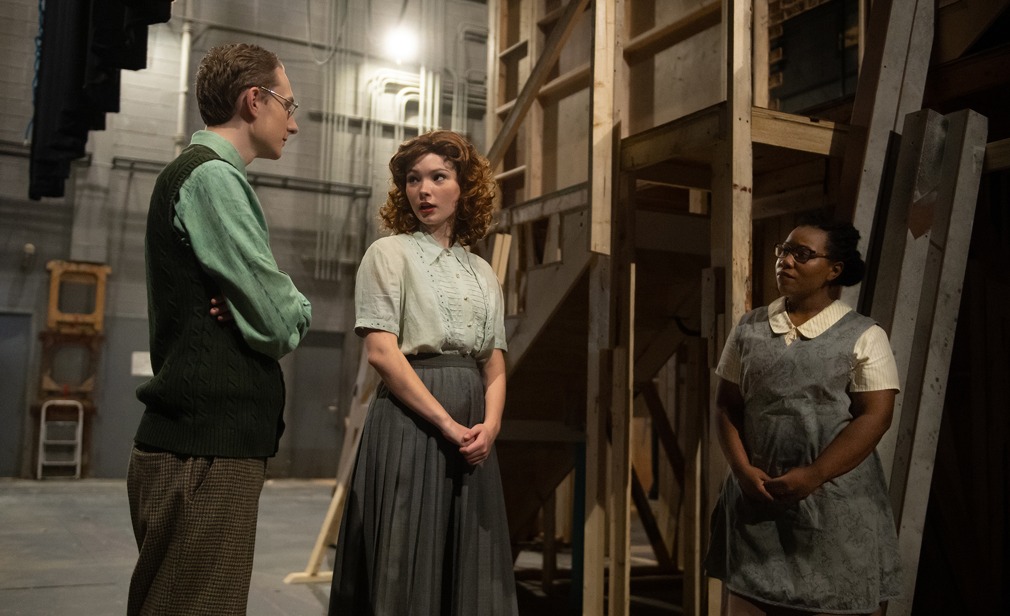 Hannah Rose Richards (center), as theater director Maggie Dalton in George Brant’s “Into the Breeches!” discusses the fictional Oberon Play House’s production of Shakespeare’s “Henriad” with that theater’s stage manager, Stuart Lasker, played by Ward Sikma (left), and seamstress, Ida Green, played by Catrina Winters. Photo by Kevin Bain/Ole Miss Digital Imaging Services