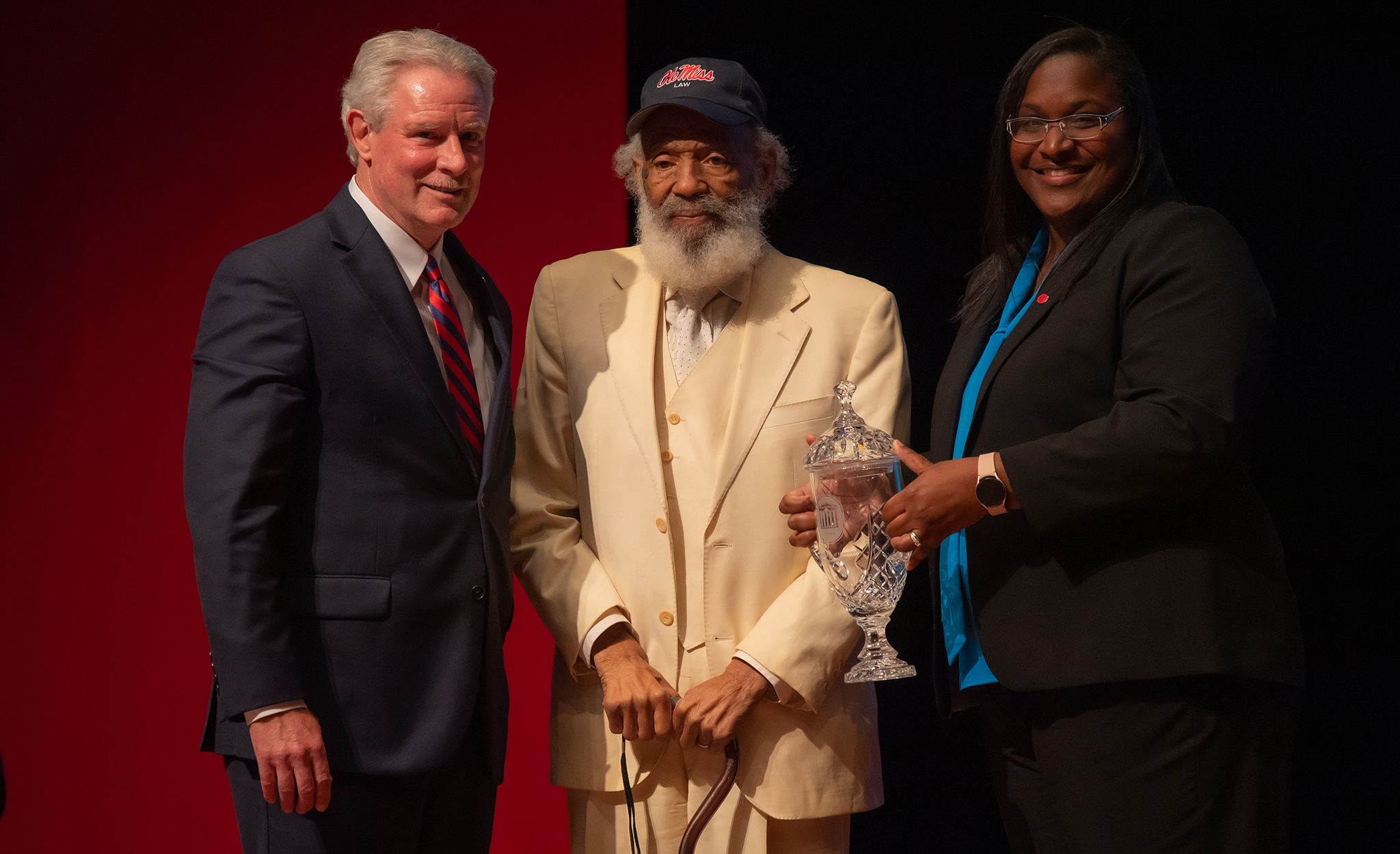 Chancellor Glenn Boyce (left) and Shawnboda Mead (right), UM vice chancellor for diversity and community engagement, present James Meredith with the Mississippi Humanitarian Award on Wednesday (Sept. 28) at the Gertrude C. Ford Center for the Performing Arts. The honor is one of the university’s most distinguished awards. Photo by Kevin Bain/Ole Miss Digital Imaging Services