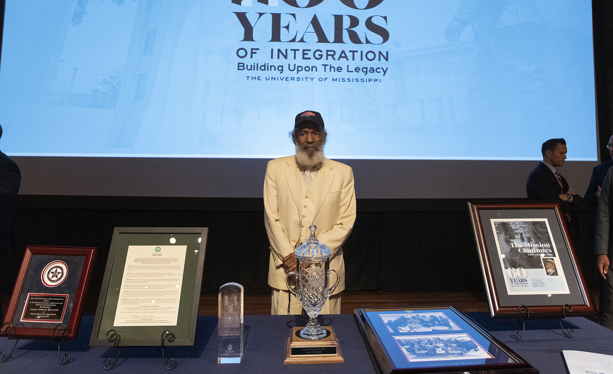 James Meredith shows off the numerous awards and recognitions presented to him Wednesday (Sept. 28) during ‘The Mission Continues: Building Upon the Legacy,’ the signature event commemorating the 60th anniversary of his enrollment at the University of Mississippi. Photo by Thomas Graning/Ole Miss Digital Imaging Services