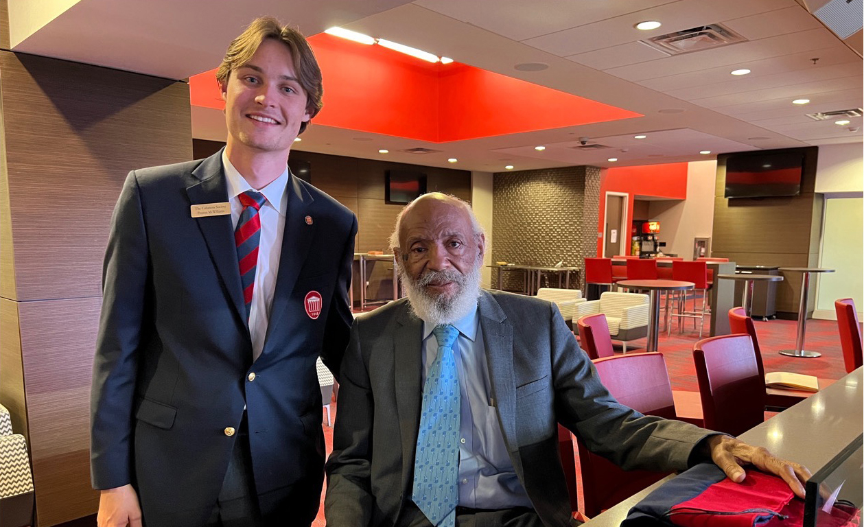 UM senior Michael McWilliams (left), president of the Columns Society, chats with James Meredith before an event. The society’s 2022-23 class has been named in Meredith’s honor. Submitted photo