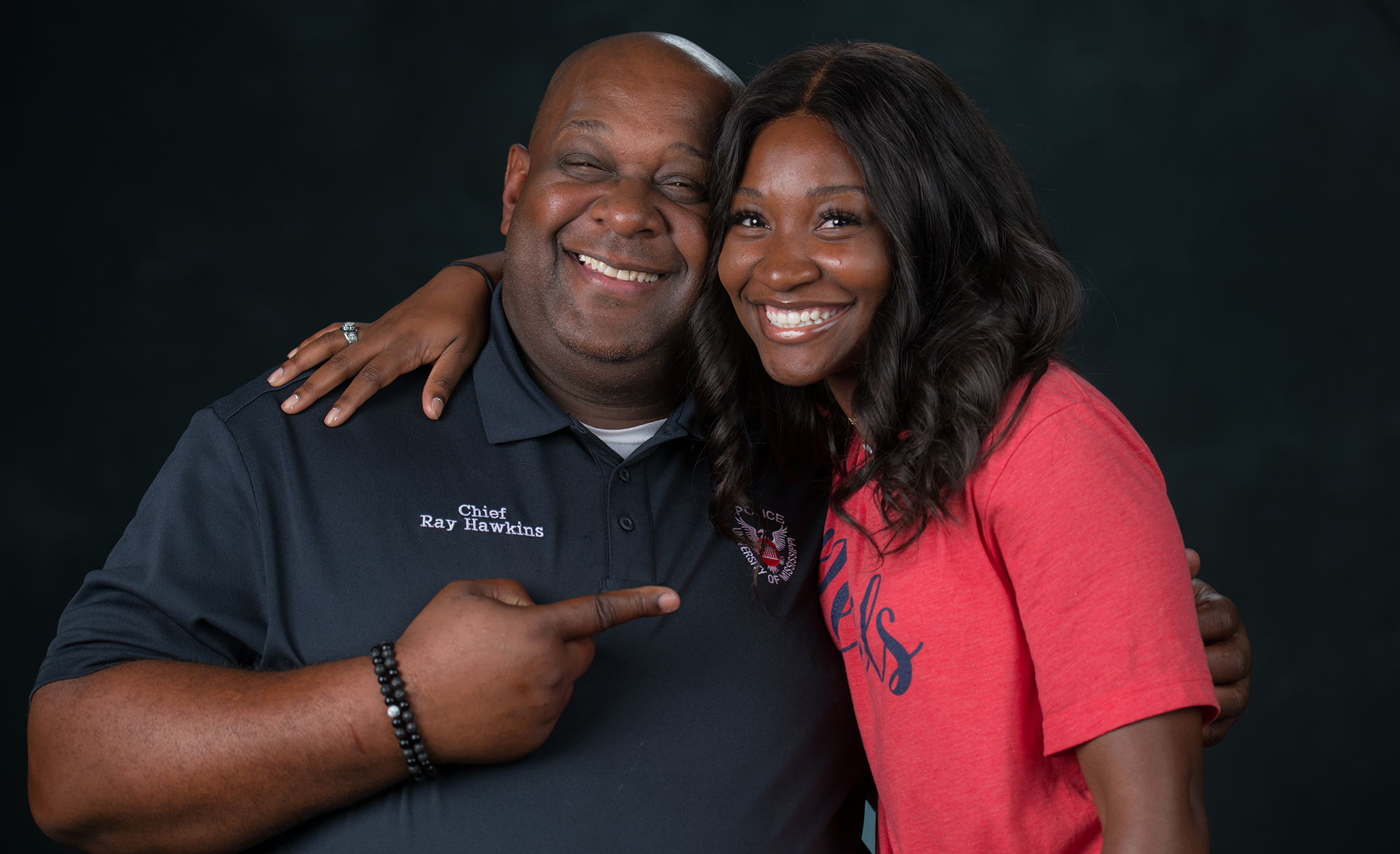 a’Nia Hawkins (right), an allied health studies major, says there’s no place like Ole Miss and is happy to have followed her dad, retired UPD Chief Ray Hawkins (BA 01), there. Photo by Kevin Bain/Ole Miss Digital Imaging Services