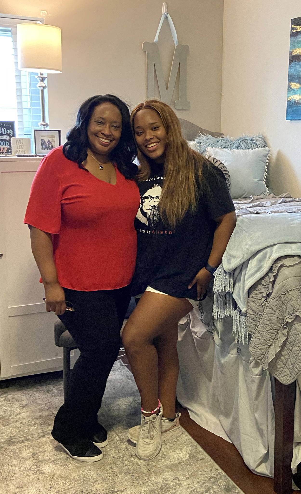 Janelle Minor (right) poses with her mom, Ethel Scurlock, in her residence hall room at the university. Submitted photo