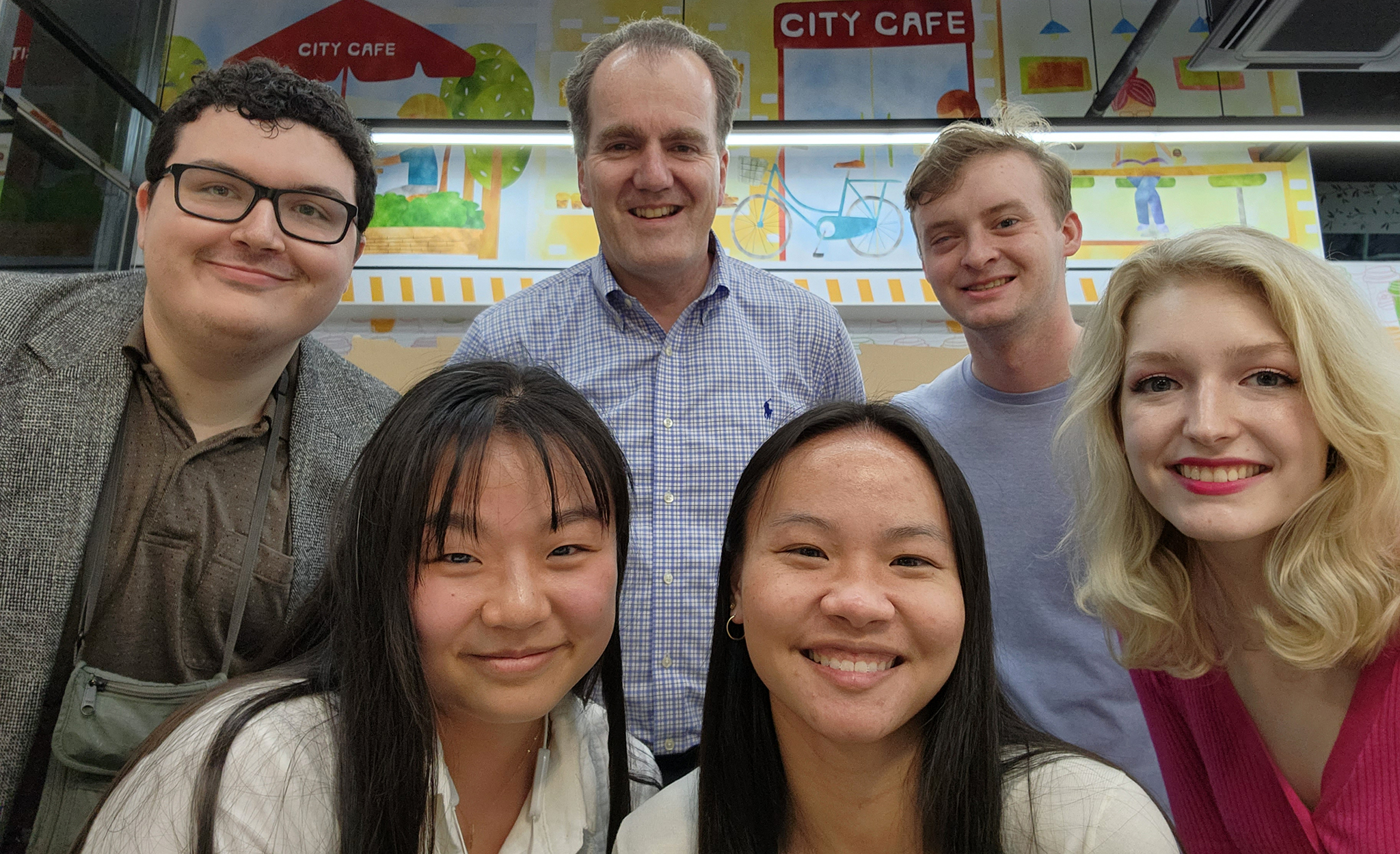 Oliver Dinius (top center), executive director of the Croft Institute for International Studies, meets with Ole Miss students studying abroad in Taiwan. Dinius invited the students to dinner while he visited Taipei in March on a Fulbright International Education Administrator Award trip. Submitted photo