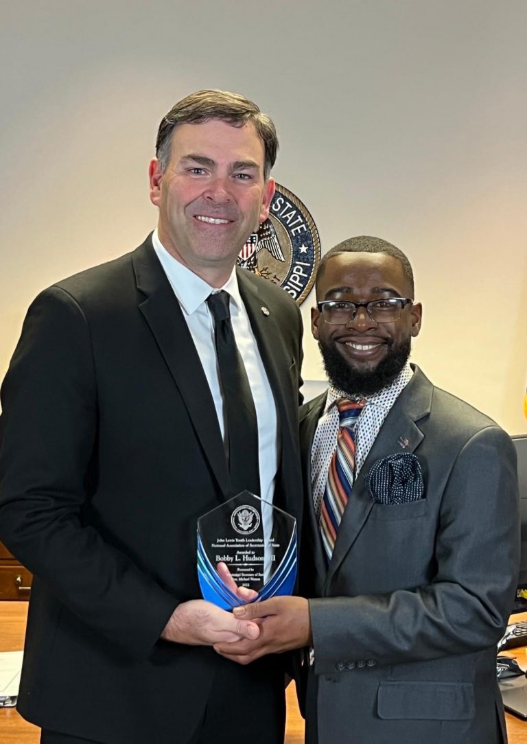 Mississippi Secretary of State Michael Watson (left) presents Ole Miss senior Bobby Hudson III with his John Lewis Youth Leadership Award at the state Capitol. Submitted photo