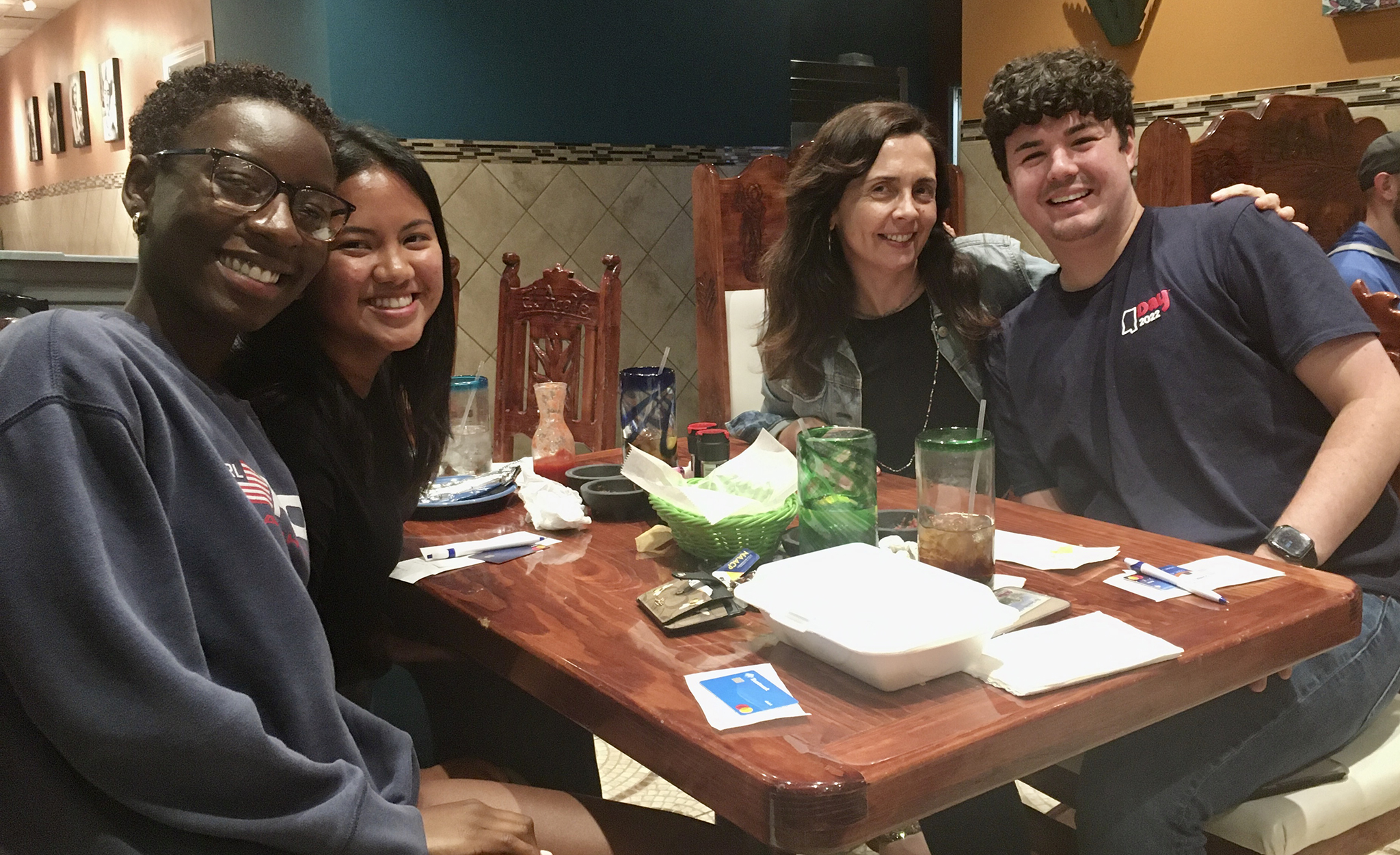Spanish professor Carmen Sanchis-Sinisterra (second from right) spends time with Ole Miss Spanish language students (from left) Te’keyra Shelton, of Tupelo; Olivia Reeves, of Sulphur, Louisiana; and Landon Bradley, of Laurel. Sanchis-Sinisterra has been chosen for the 2023-24 cohort of the Engaged Scholars Initiative by Campus Compact. Submitted photo