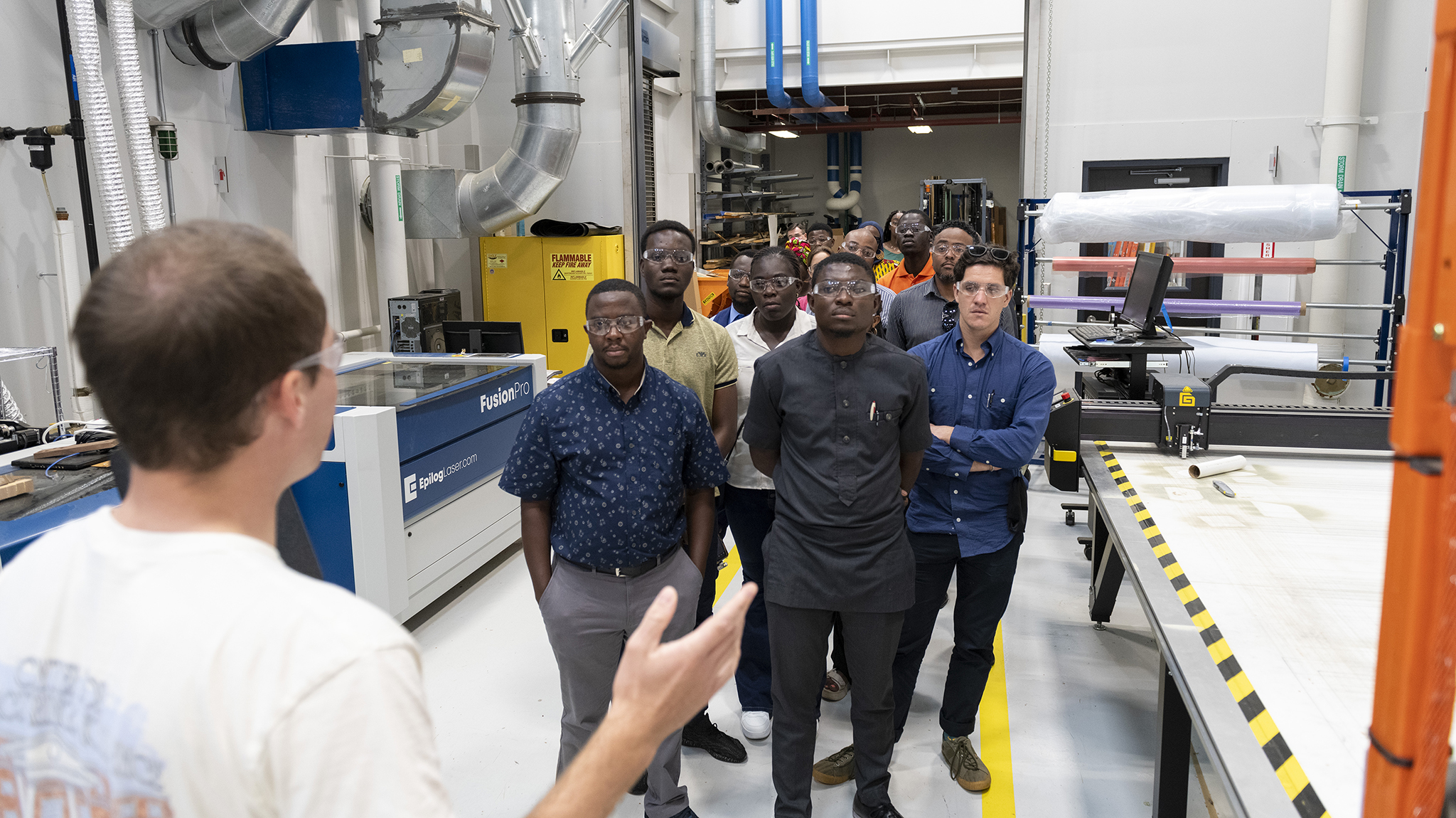 Fellows from the ninth annual cohort of Mandela Washington Fellowship for Young African Leaders tour the Haley Barbour Center for Manufacturing Excellence as a part of the Jackson State University-led group’s visit to Ole Miss. Photo by Sri Chattopadhyay/Ole Miss Digital Imaging Services
