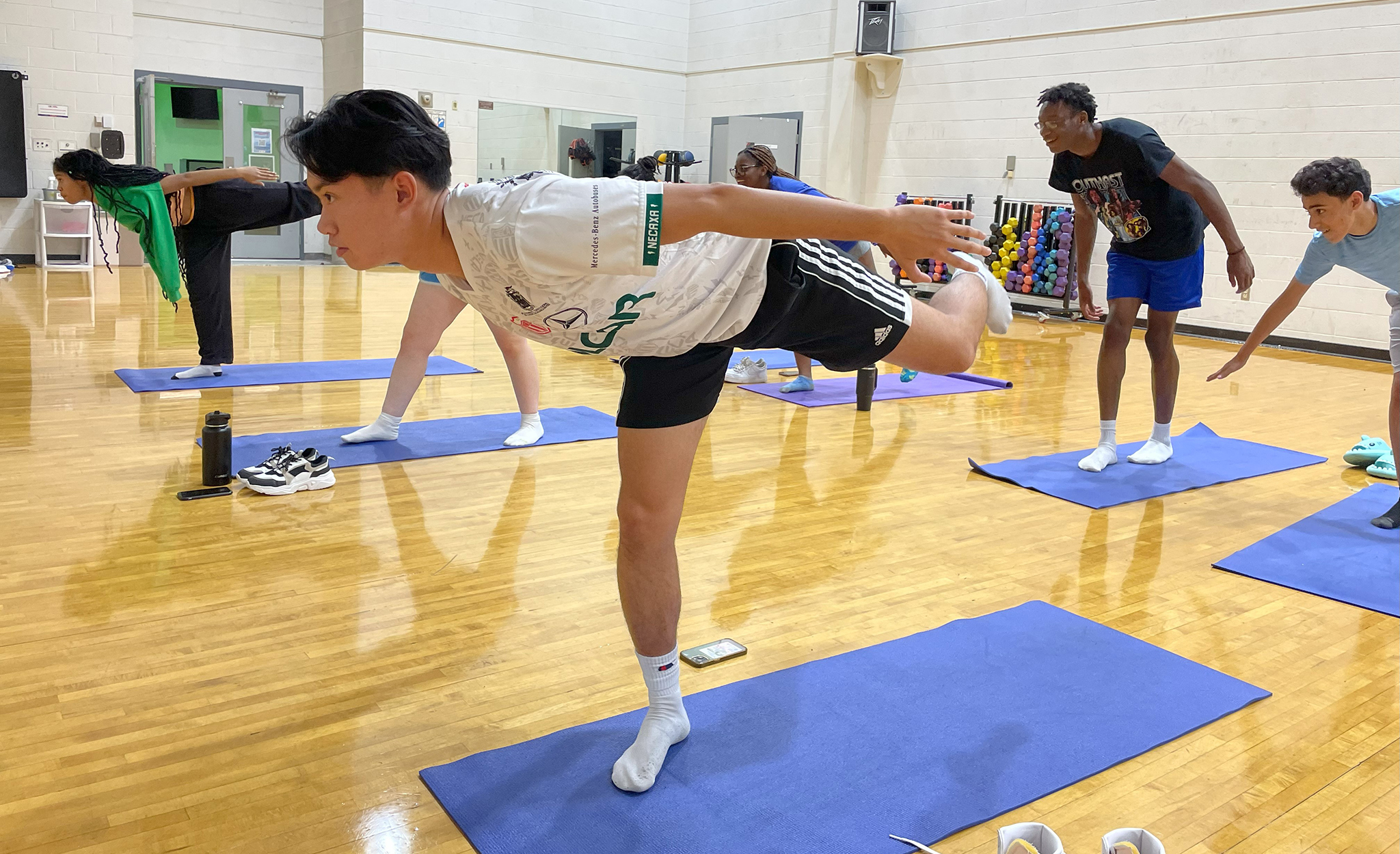 Rising high school juniors and seniors from across the country participate in yoga during an after-class activity during the university’s second annual Summer Language Institute. The monthlong institute provides high-level Chinese language-learning for high school students. Submitted photo